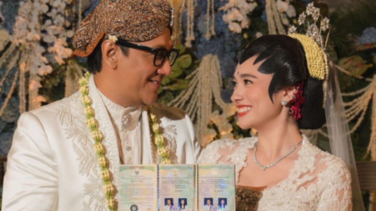 Andre Taulany dan Amanda Rigby resmi menikah.
